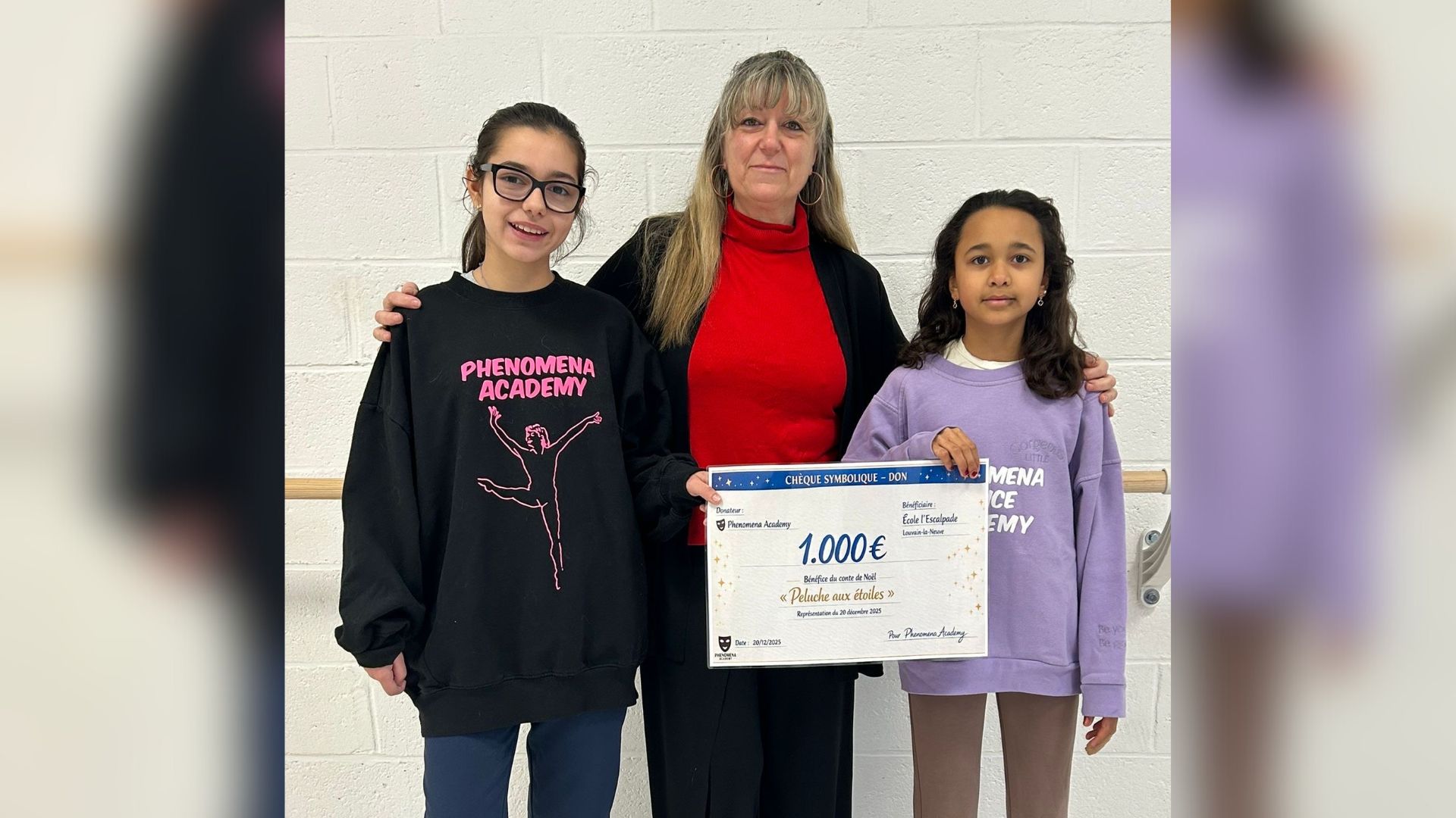 Phenomena Academy offre 1.000 euros à l'ASBL L'Escalpade grâce à un conte de Noël