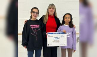 Phenomena Academy offre 1.000 euros à l'ASBL L'Escalpade grâce à un conte de Noël